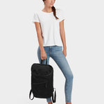 MILTHREAD Bold top load 20L everyday backpack in black on model