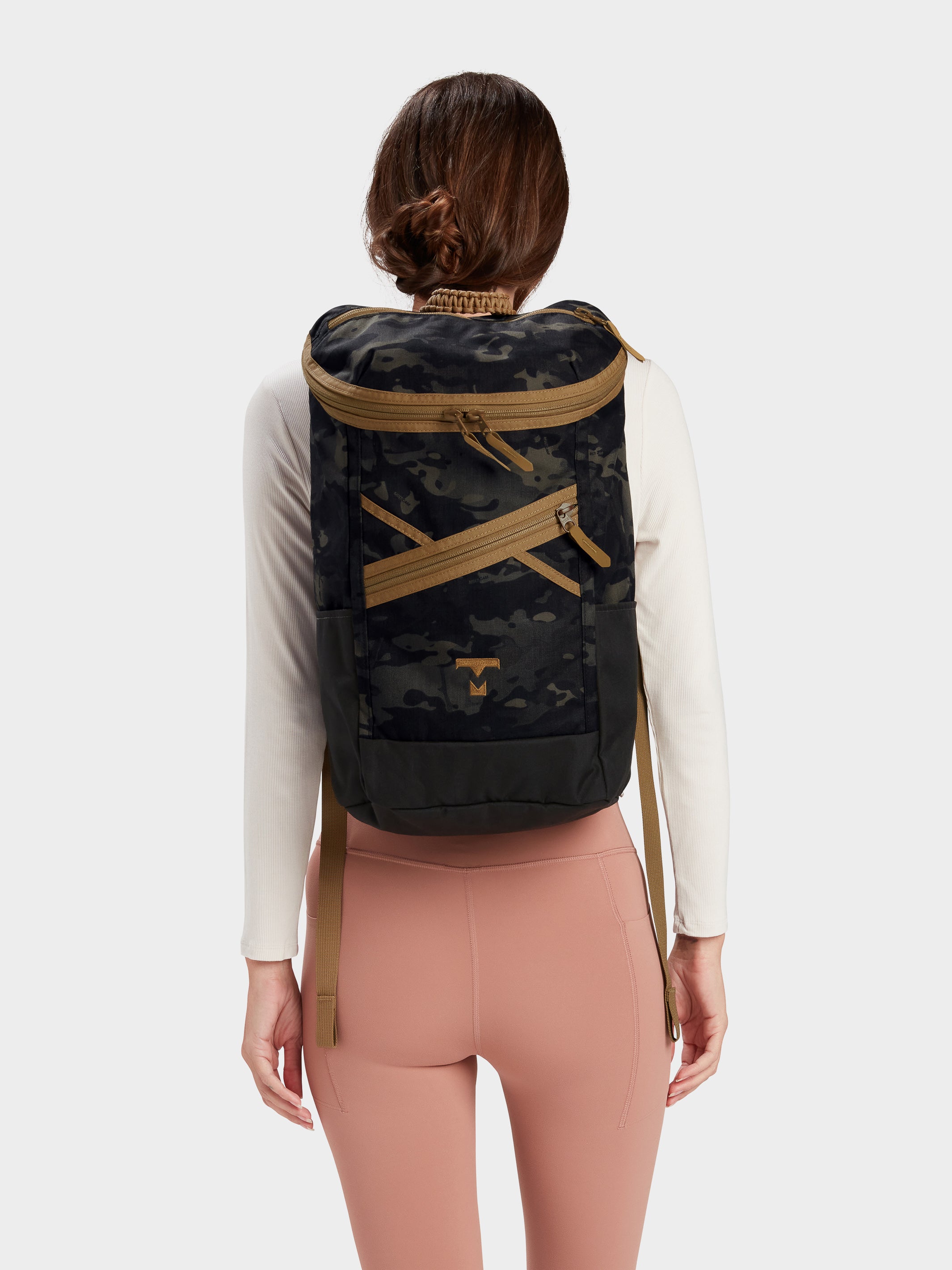 MILTHREAD Bold top load 20L everyday backpack in Multicam Black on model