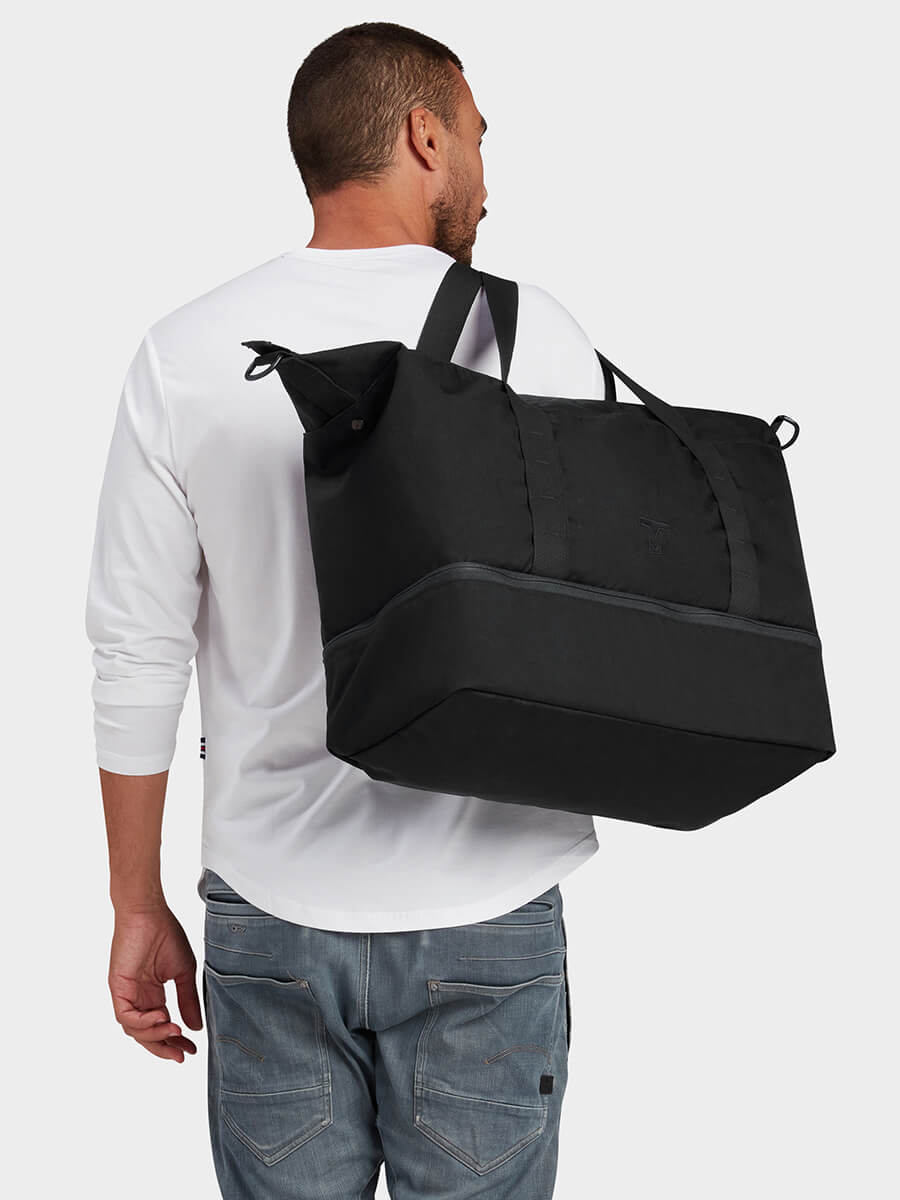 MILTHREAD Canyon 33L travel tote in black on model