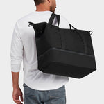MILTHREAD Canyon 33L travel tote in black on model
