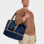 MILTHREAD Canyon 33L travel tote in midnight on model