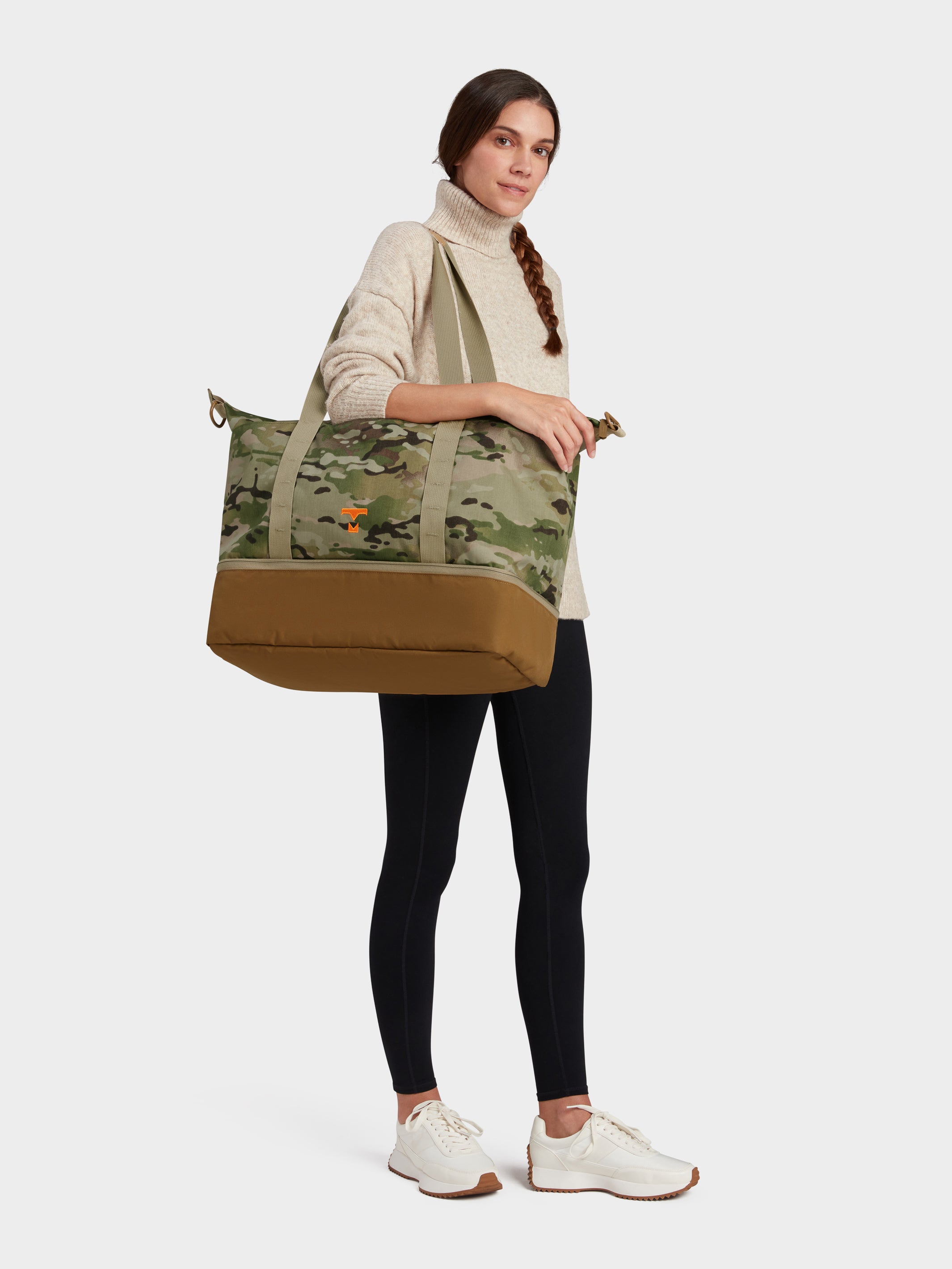 MILTHREAD Canyon 33L travel tote in multicam on model