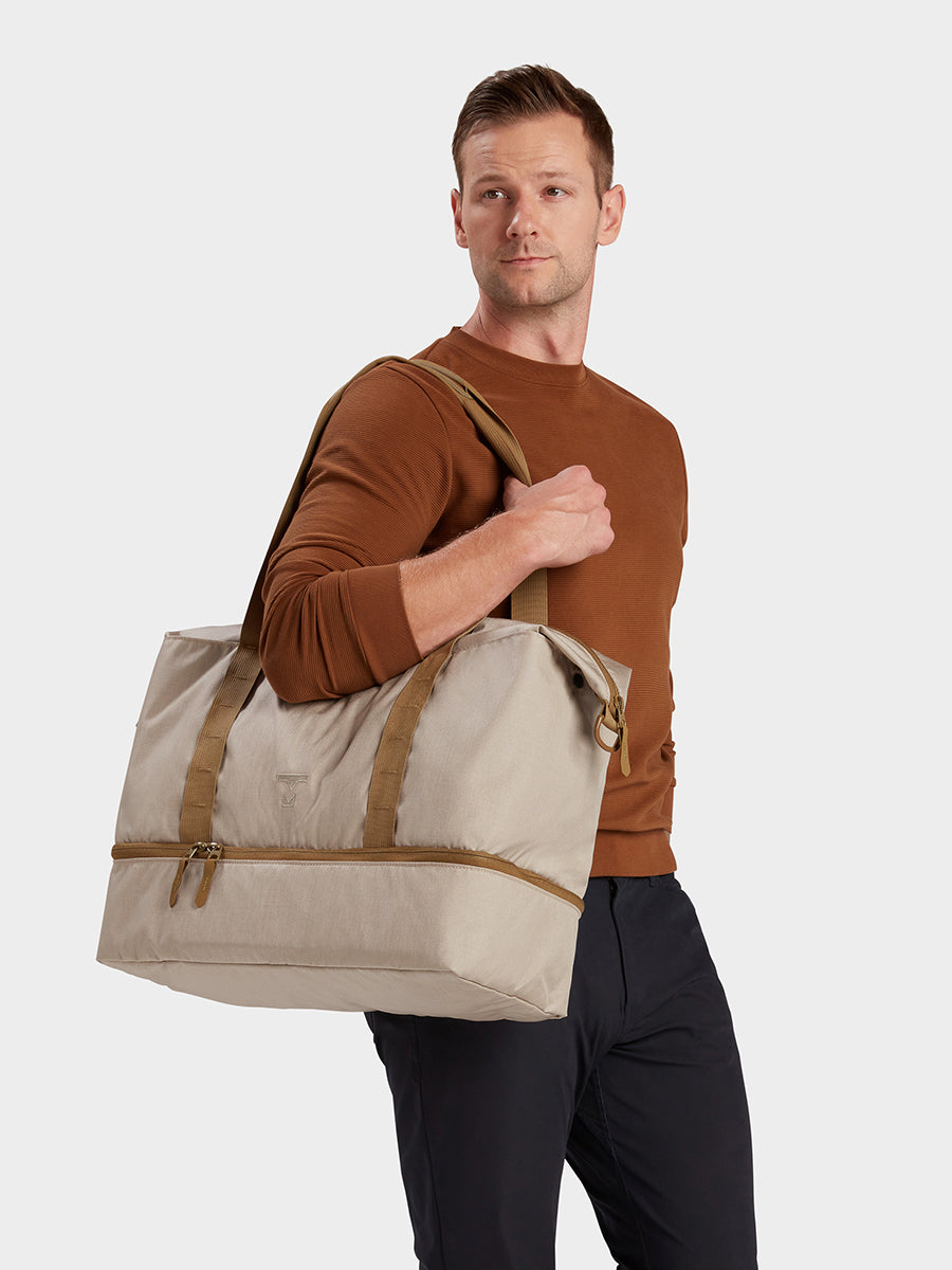 MILTHREAD Canyon 33L travel tote in sand on model