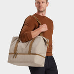 MILTHREAD Canyon 33L travel tote in sand on model