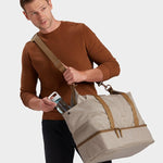 MILTHREAD Canyon 33L travel tote in sand on model