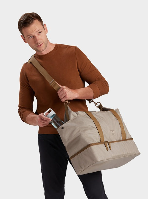 MILTHREAD Canyon 33L travel tote in sand on model