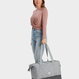 MILTHREAD Canyon 33L travel tote in silver dust on model