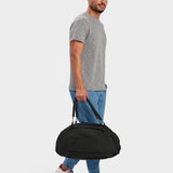 MILTHREAD Grit Duffel 25L travel bag in black on model