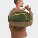 MILTHREAD Grit Duffel 25L travel bag in camo green on model