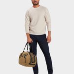 MILTHREAD Grit Duffel 25L travel bag in coyote brown on model