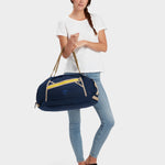 MILTHREAD Grit Duffel 25L travel bag in midnight on model