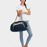 MILTHREAD Grit Duffel 25L travel bag in midnight on model