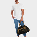 MILTHREAD Grit Duffel 25L travel bag in multicam black on model