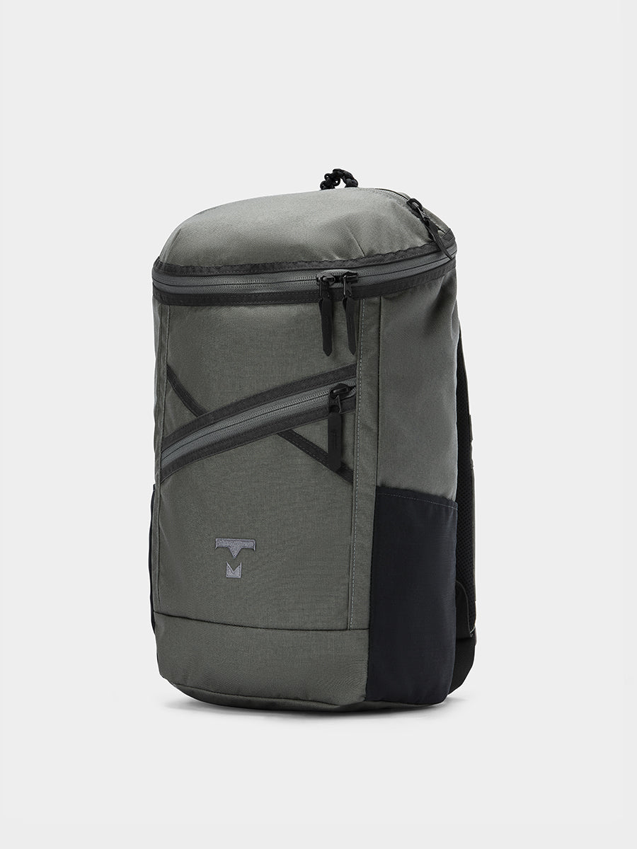 Bold backpack in foliage tabletop front 45 degree view