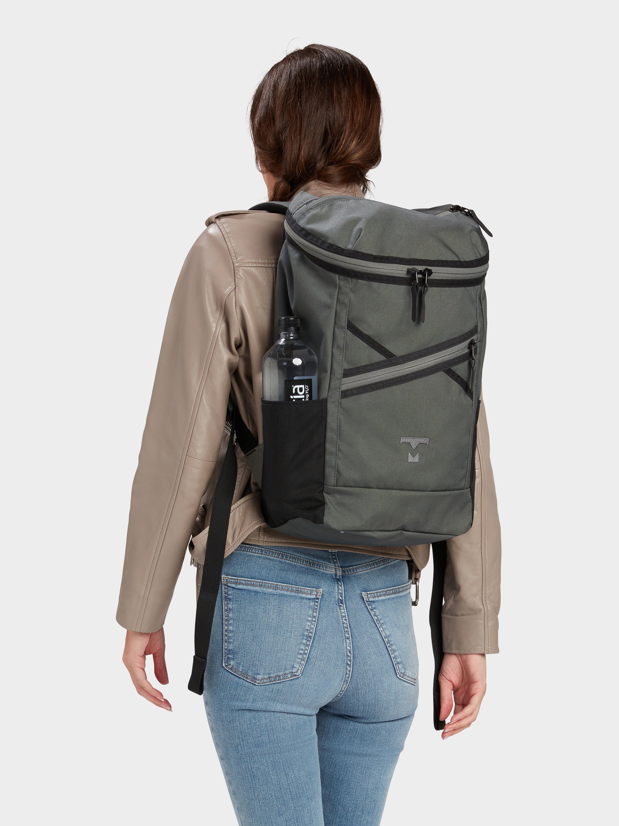 Bold backpack in foliage carried by model