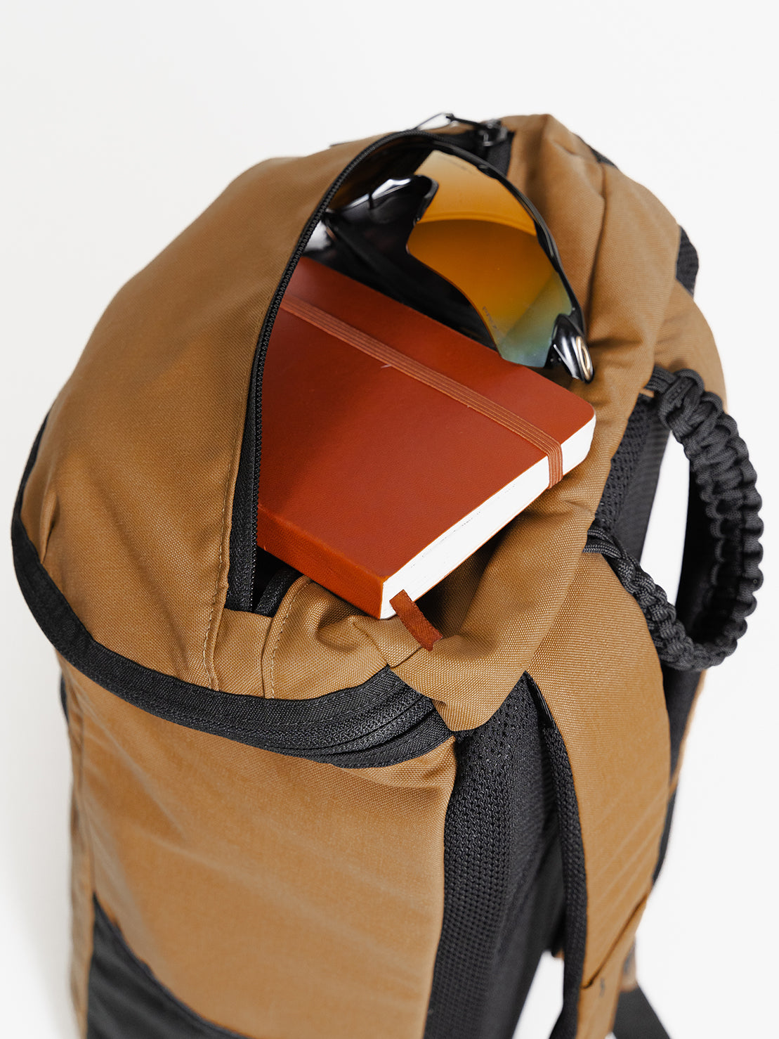 MILTHREAD Bold top load 20L backpack features zippered stash pocket