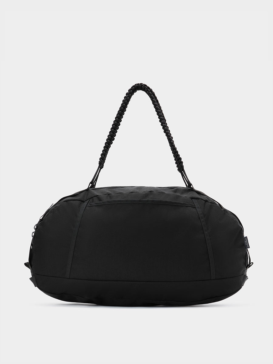 Grit duffle in black tabletop in back view