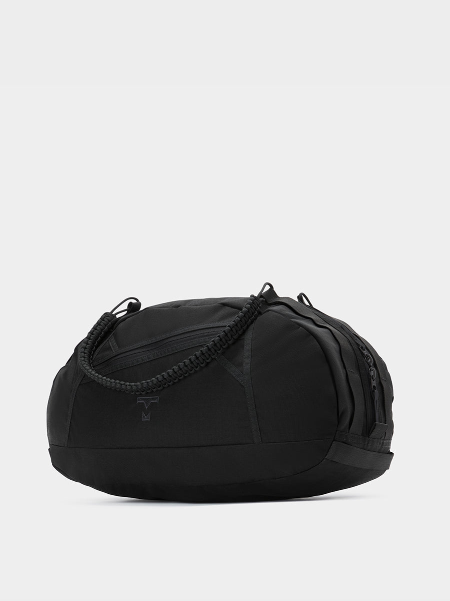 Grit duffle in black tabletop in front 45 degree view