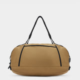 Grit duffle in coyote brown tabletop in back view