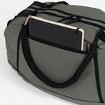 MILTHREAD Grit Duffel 25L travel bag features back pocket for quick access
