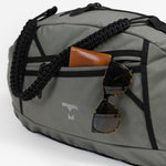 MILTHREAD Grit duffel 25L travel bag features large zippered pocket