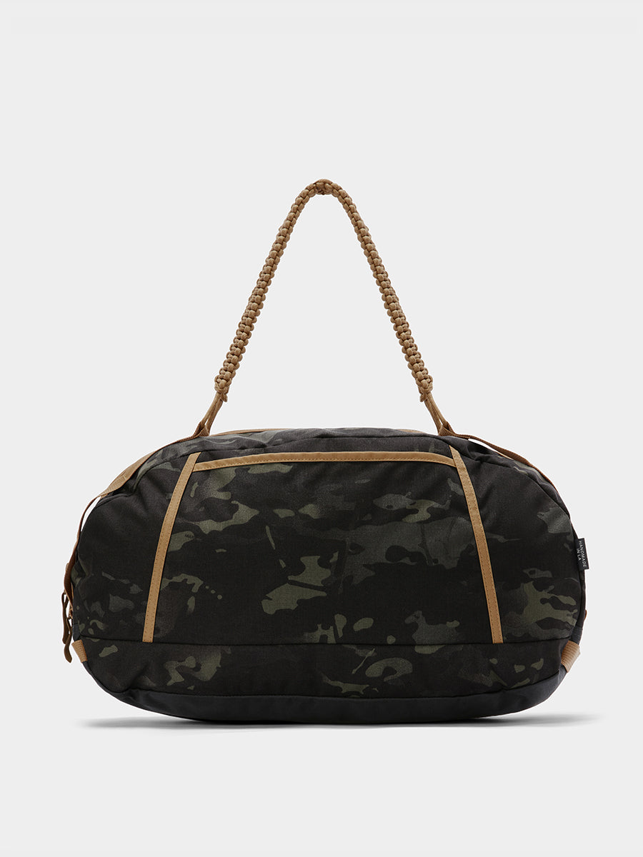 Grit duffle in multicam black tabletop in back view