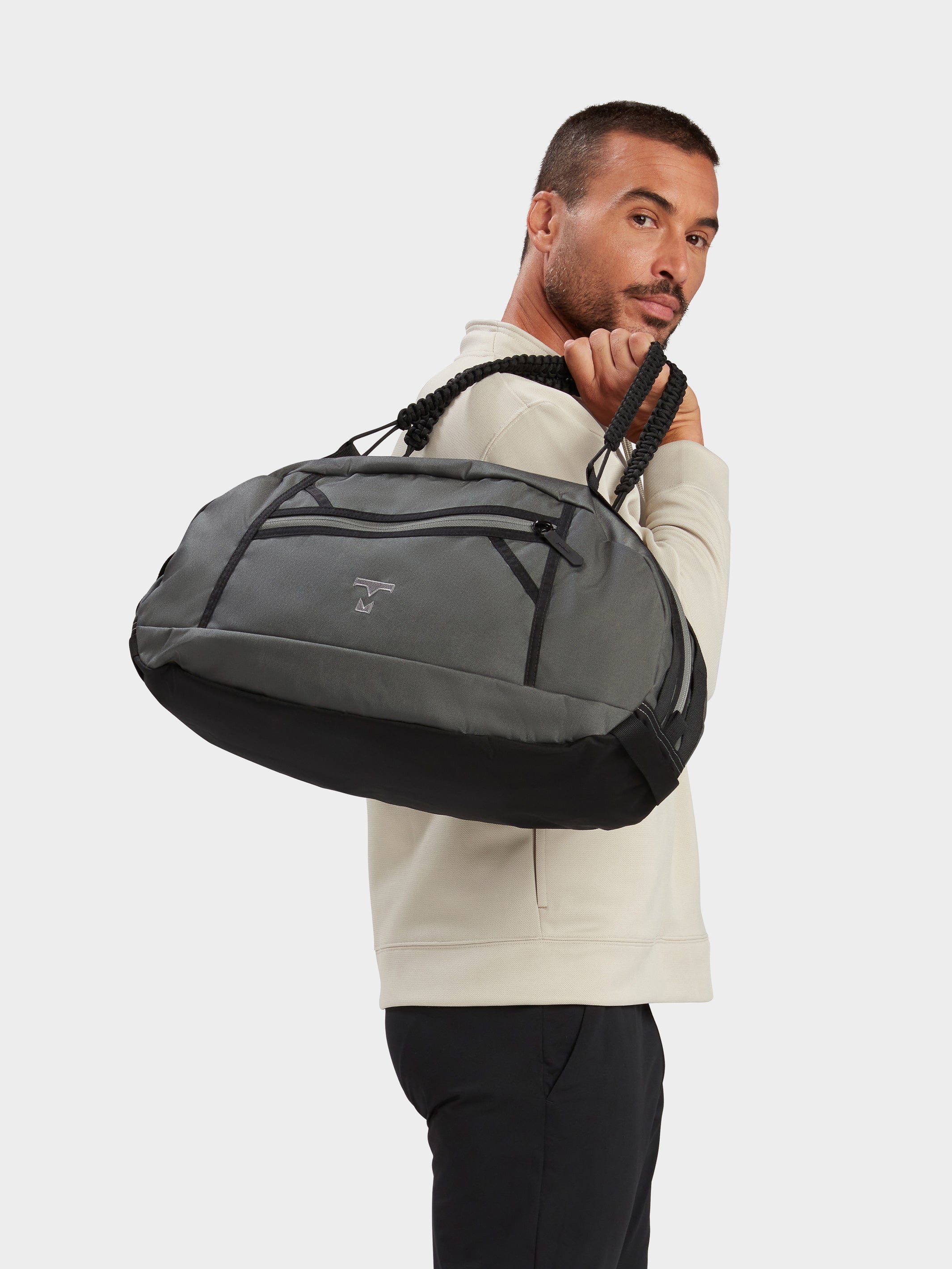 Grit duffle in foliage carried by model