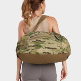 Grit duffle in multicam carried by model