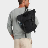 Swift backpack in black carried by model