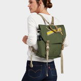 Swift backpack in camo green carried by model