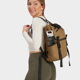 Swift backpack in coyote brown carried by model