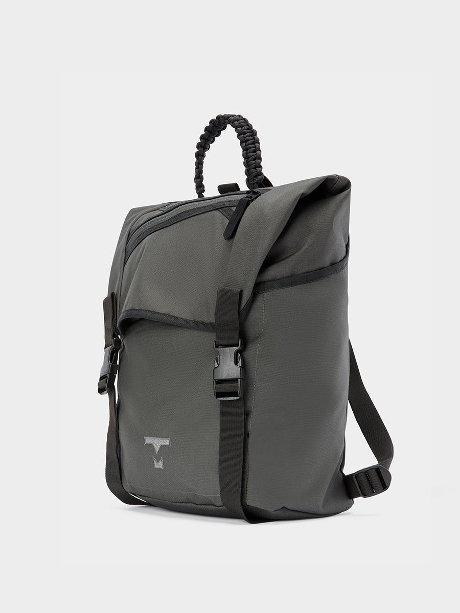 Swift backpack in foliage tabletop front 45 degree view