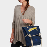 Swift backpack in midnight carried by model