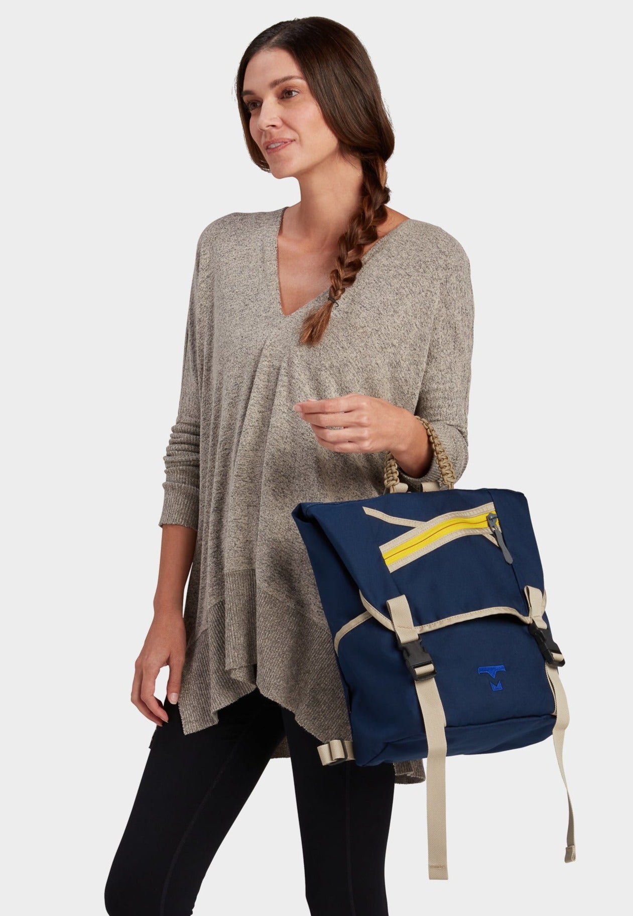 Swift backpack in midnight carried by model