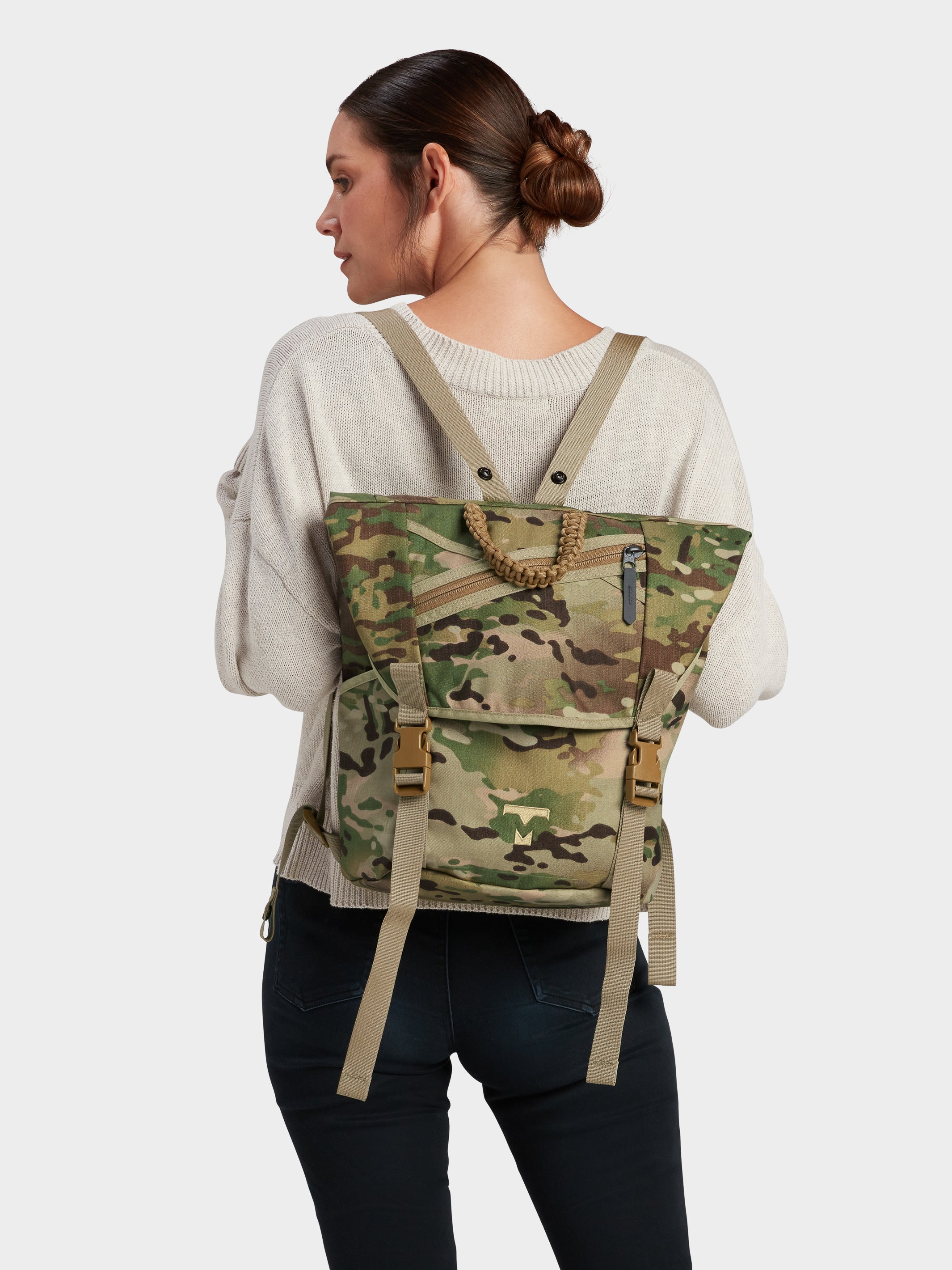 Swift backpack in multicam carried by model