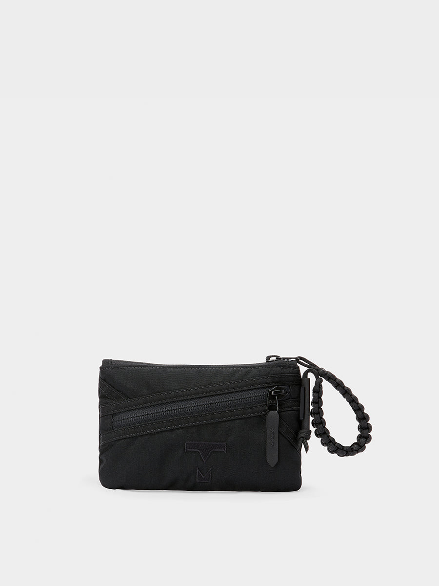 Zest wristlet in black tabletop front view