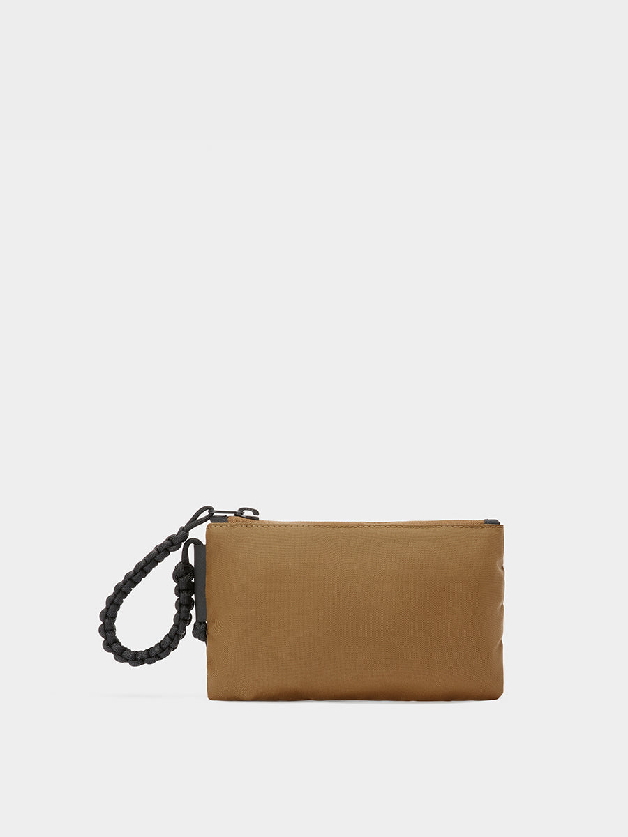 Zest wristlet in coyote brown tabletop back view