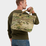 Zing tote in multicam carried by model